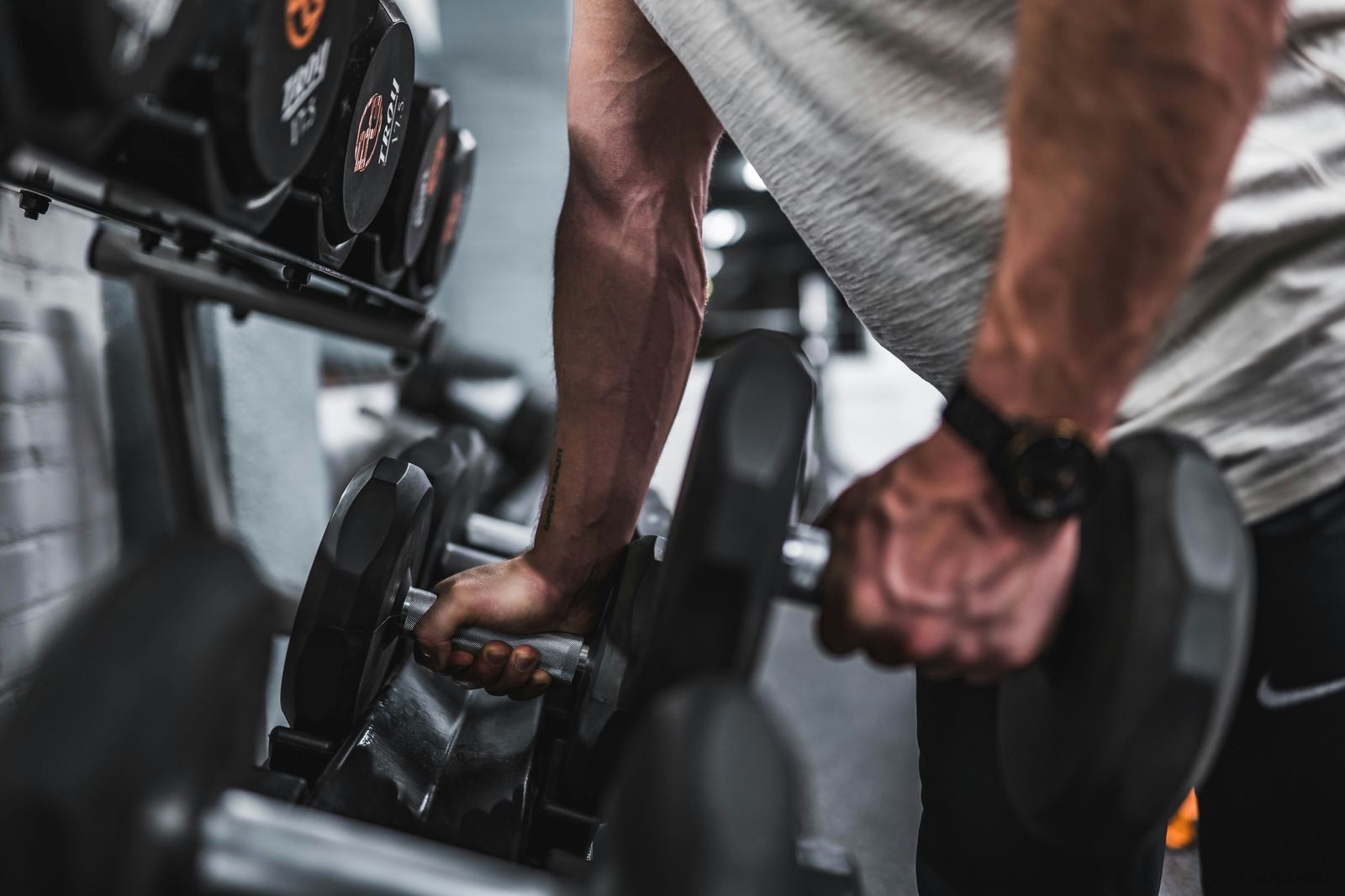 Person lifting weights at the gym